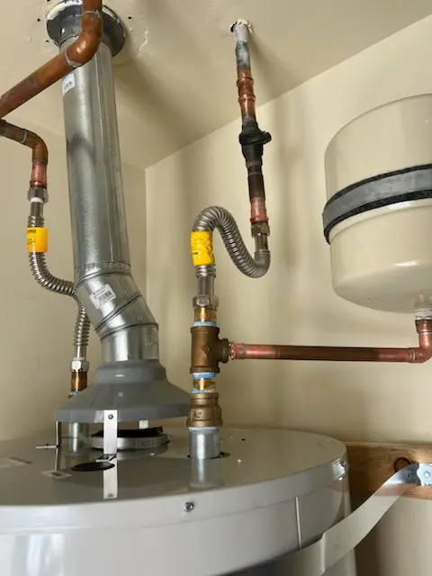 Water heater installation and plumbing repair in Center